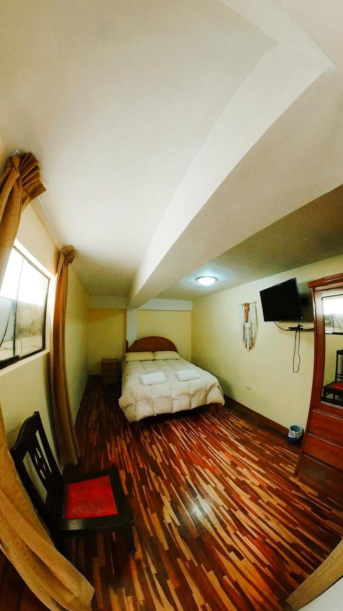 Arcopata Apartamentos クスコ 部屋 写真